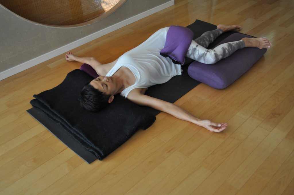 Featured Restorative Pose: Supported Supine Twist - Yoga for Times of ...