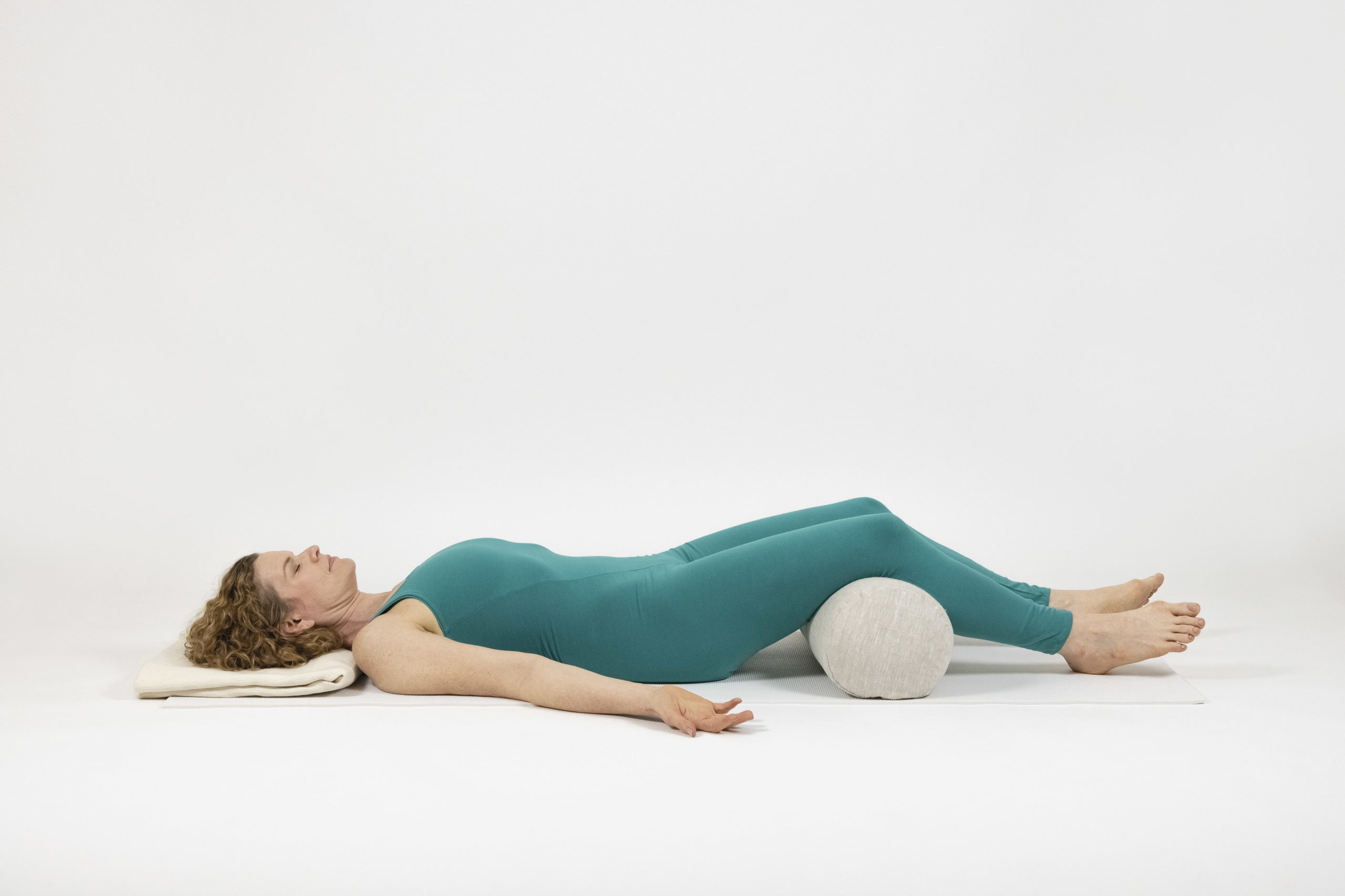Restorative yoga prop setup for savasana (for pregnant folks